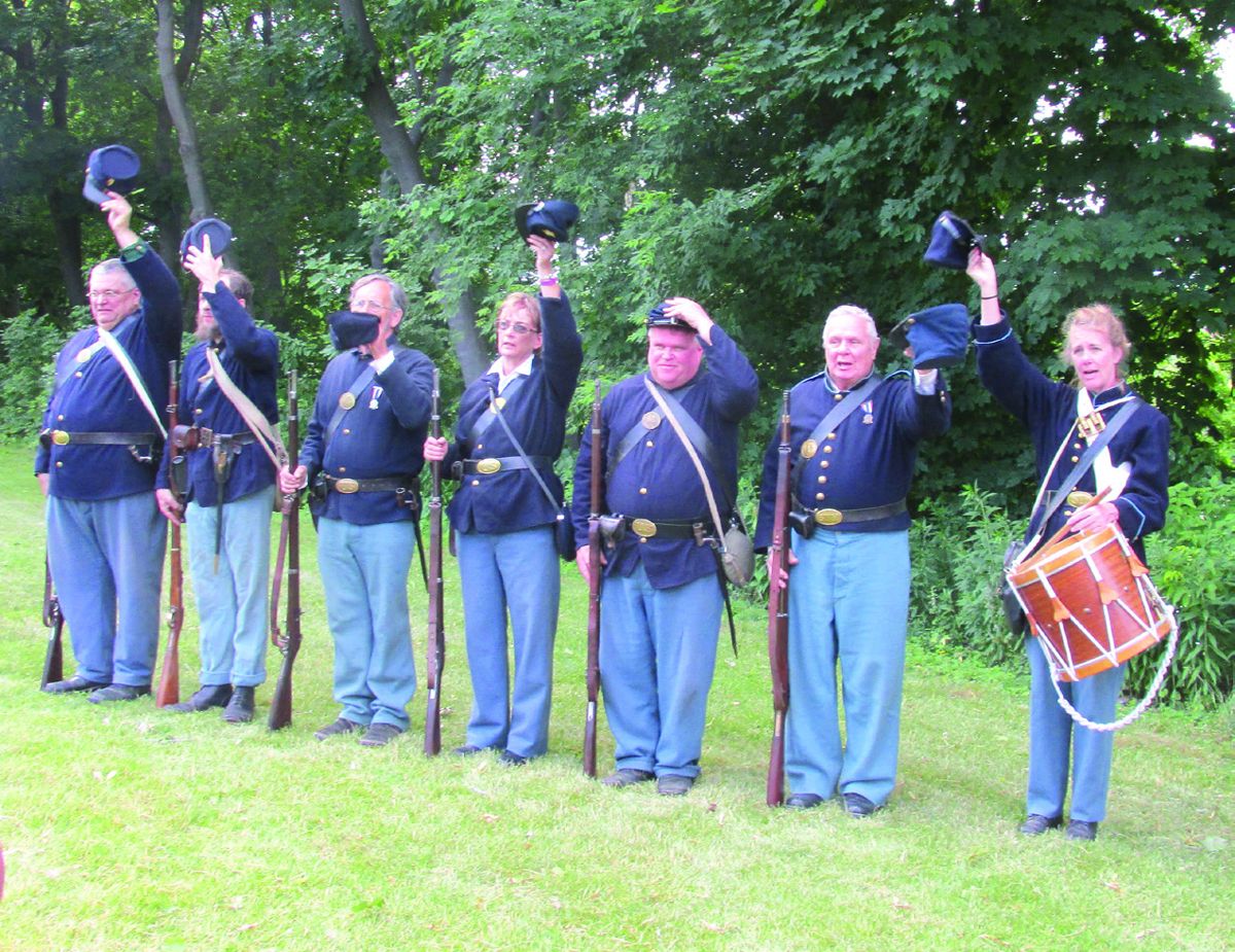 Reenactors of the 137th N.Y. offer three cheers for Col. Ireland and his
