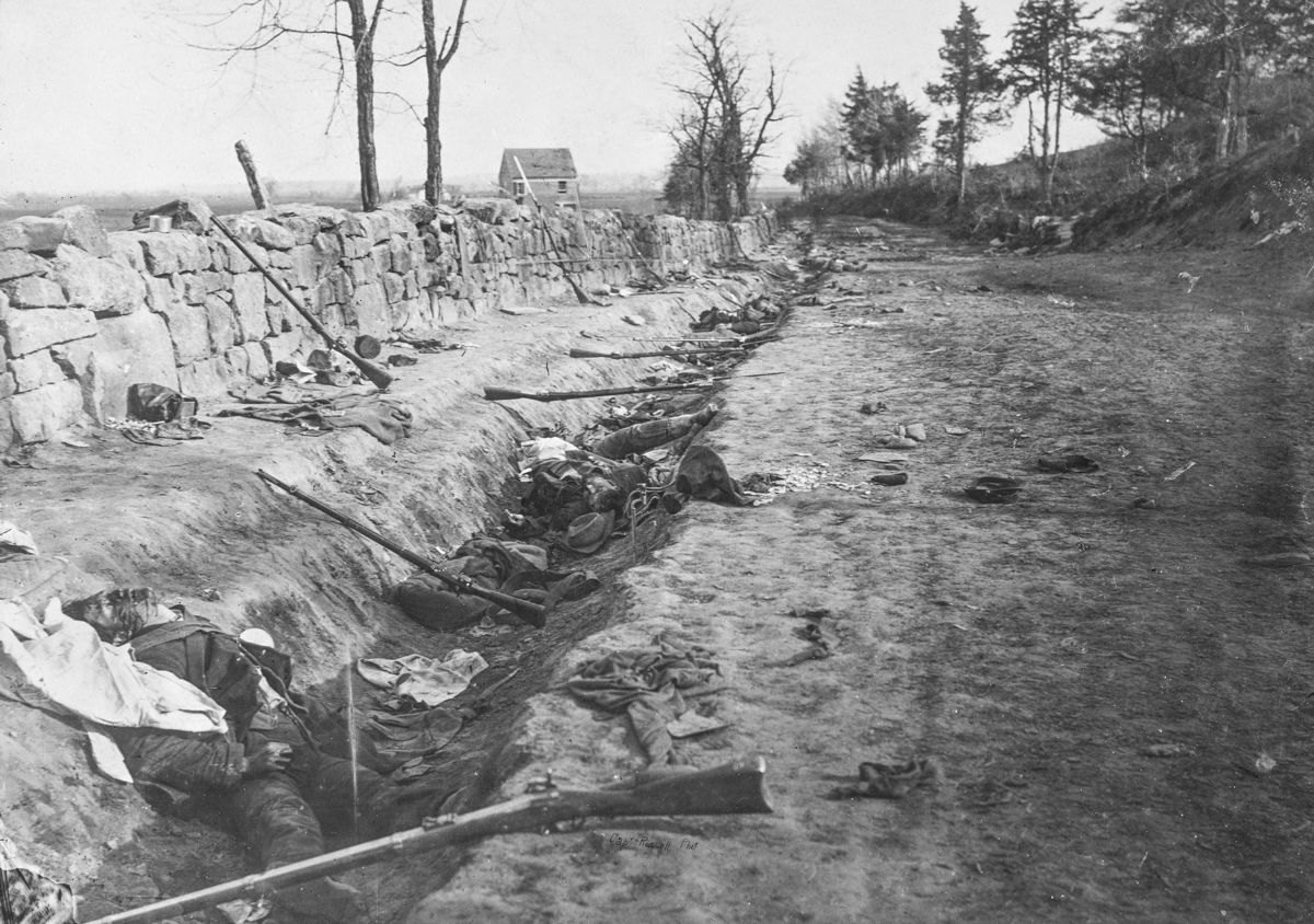 Stone wall at foot of Marye’s Heights, Fredericksburg, Va. at the front carried by 6th Maine Infantry, May 3, 1863. Photographed twenty minutes after storming party had [...] up the hill by Andrew J. Russell.