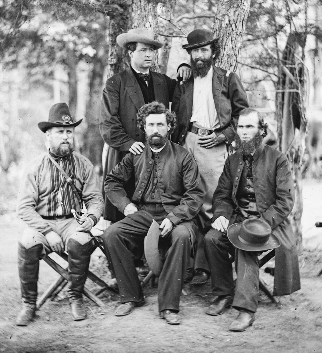 Photograph taken at Harrison’s Landing, Va, of a group of the Irish Brigade. Photo shows: (back row) Patrick Dillon, unidentified; and (front row, left to right) unidentified, James Dillon, and Father William Corby. The identified men are priests of the Congregation of the Holy Cross, University of Notre Dame. (Source: E. Hogan, Univ. Notre Dame Archives, 2009.)