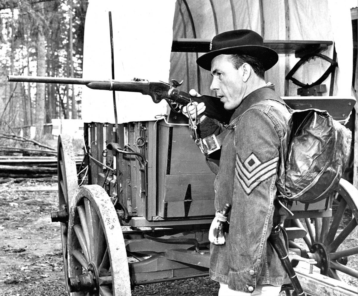 Sergeant Bill Johnson, a reenactor with the First Oregon Artillery, poses with his Spencer carbine in May, 1965.