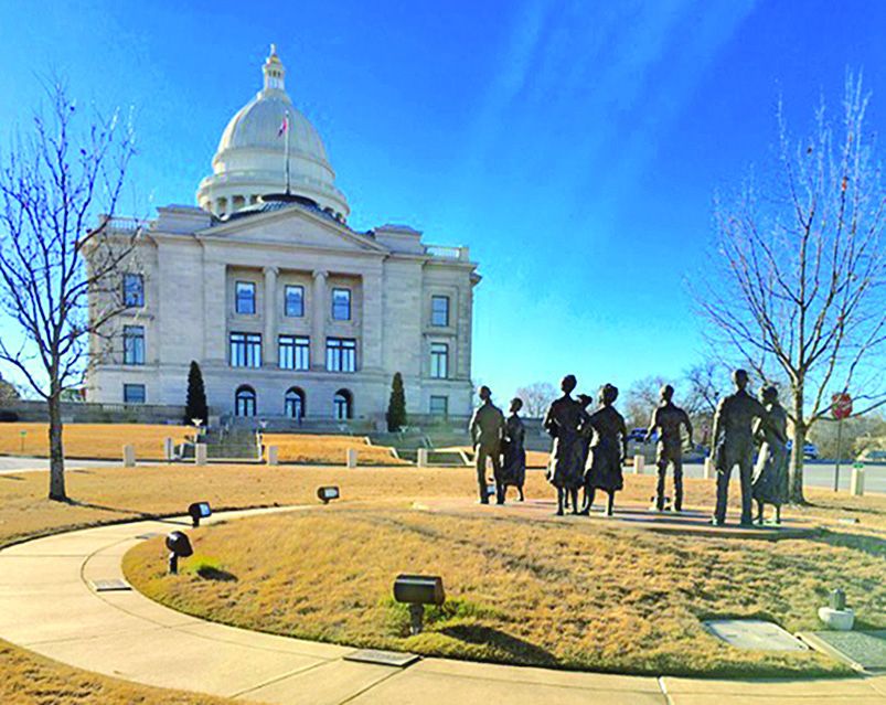 Statues to the nine black teenagers. (Jim Pfeifer)