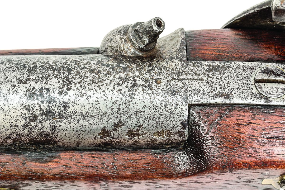 Confederate purchased P1851 Minié showing the newly applied London commercial proof marks, and remnants of the original British military proof marks.