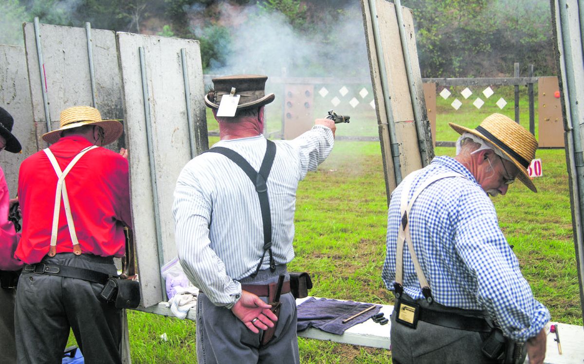 Three member teams competed in the single shot demonstration match of four events at 12.5 yards.