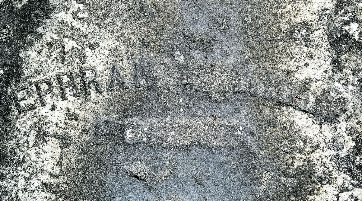 Ephraim Ponder’s name on his grave.