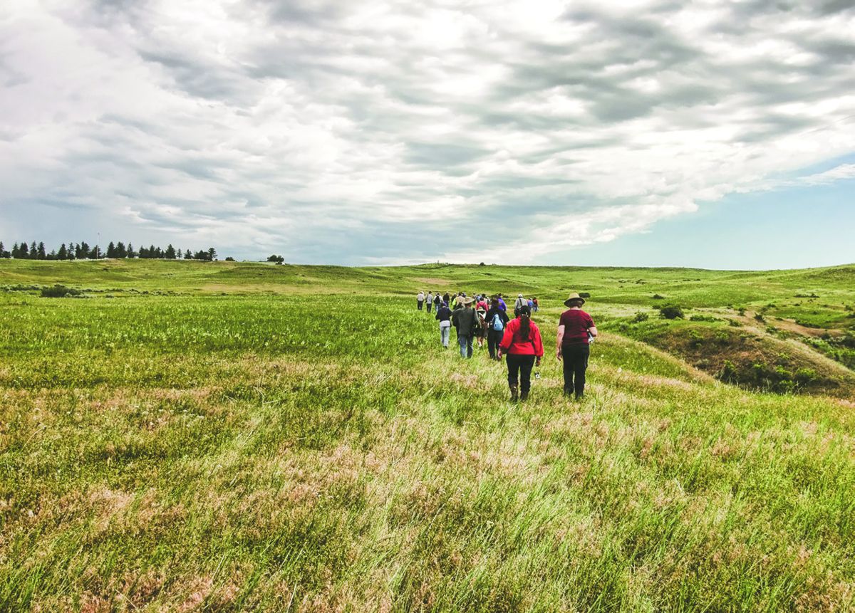 People head up a ravine toward Last Stand Hill on the Little Bighorn battlefield in southeastern Montana. (Bob Reece)