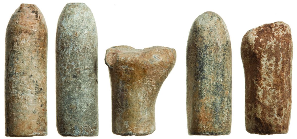 Civil War excavated Whitworth rifle bullets. Left to right: Unfired cylindrical, unfired cylindrical, fired cylindrical, unfired hexagonal, fired hexagonal.