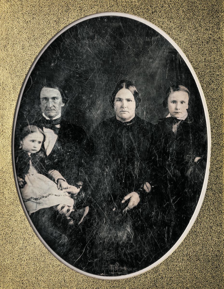 Daguerreotype of George W. Morse and family in Louisiana (1853). Left to right: Morse with his daughter, Lelia Everiste; wife, Marianne; and son, Peabody Atkinson.
