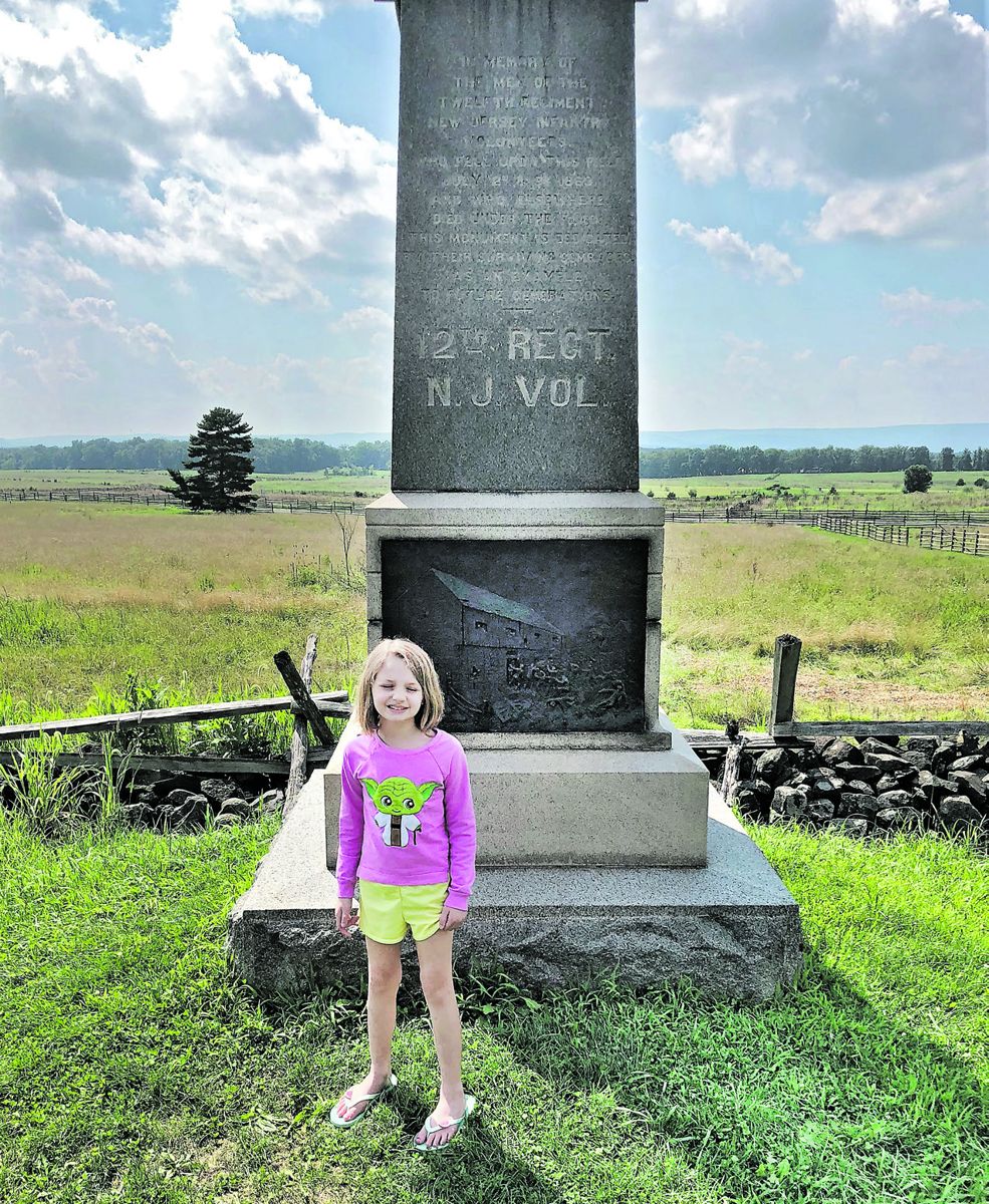 My eight-year-old granddaughter Anna poses in front of the 12th New Jersey monument at Gettysburg. You can’t start them too young.