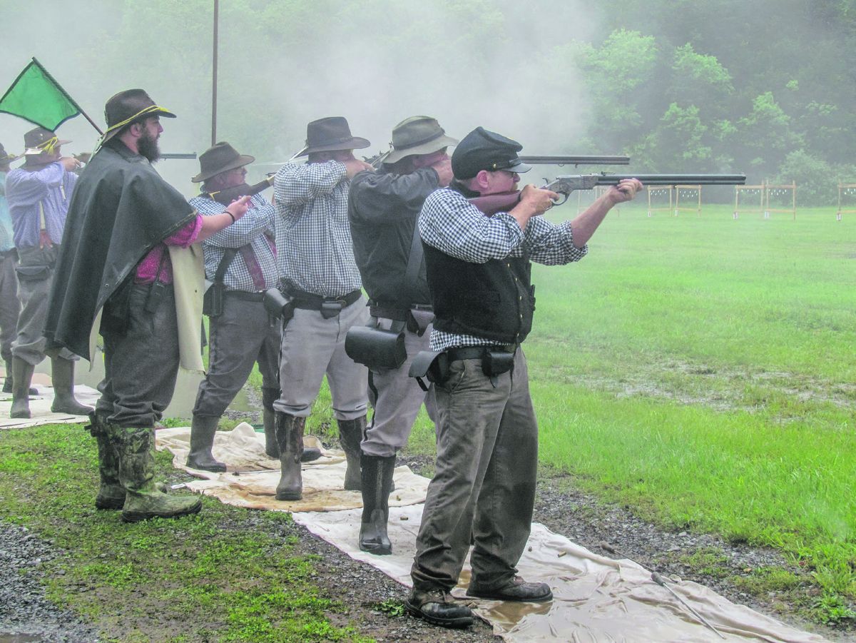 Skirmishers fire their magazine-fed Henry Rifles during the Breech Loading Rifle Match. National Skirmishes also feature matches for Spencer and for single shot rifles. (Terianne Carey)