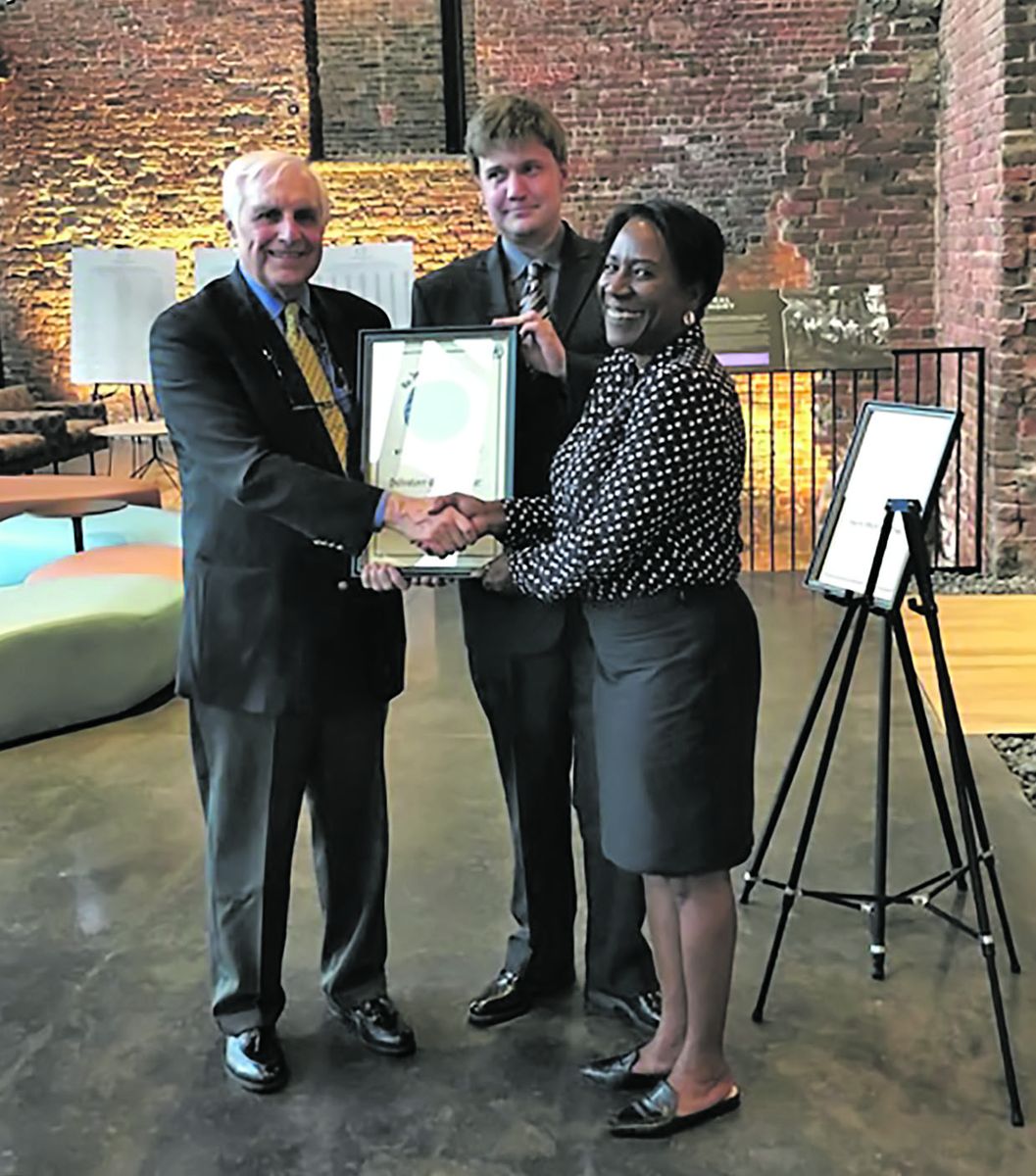 Dr. Peter C. Luebke, U.S. Military Historian, and Christy Coleman, CEO of the American Civil War Museum in Richmond, present Salvatore Cilella his award, July 1, 2019 at the awards
