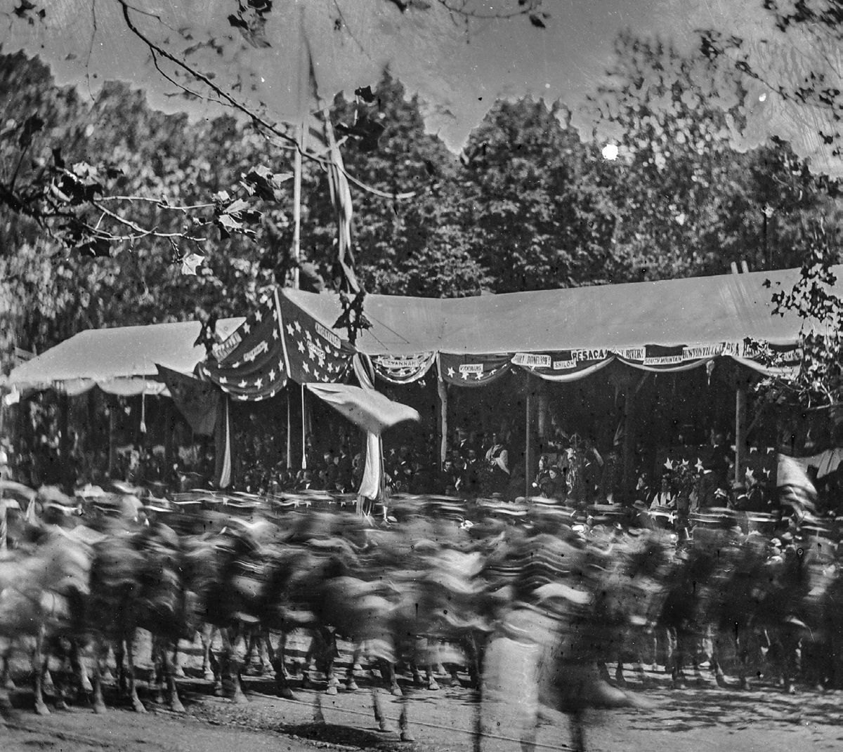 The grand review of the Army, Washington, D.C. Presidential reviewing stand with guests and guard by Mathew Brady.
