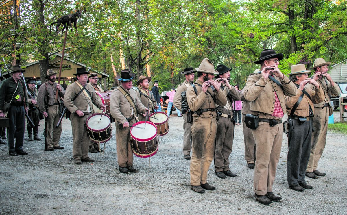 The 1st Maryland Infantry always draws a crowd while playing period fife and drum music as they march to the range before the opening ceremonies on Sunday morning. Ericka Hoffmann Curley.