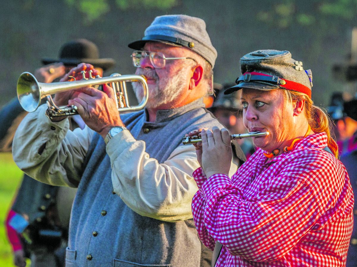 These two musicians play cornet and piccolo with the North-South Skirmish Association Field Band, performing The Star Spangled Banner, Dixie, and other period music for the Sunday morning opening ceremony. Walter Zdon Jr.