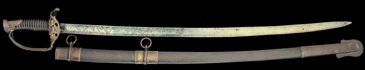The full length of the obverse side showing the complete etched panel and the original scabbard.