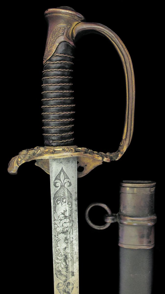 The grip is wrapped with twisted brass wire that has been given an extra turn to give it a higher profile.