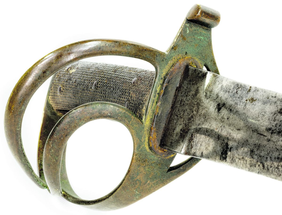 Hilt face of the 3-branch Courtney & Tennent naval cutlass. Note the buff leather throat washer” under the guard. Photo by Tim Prince.