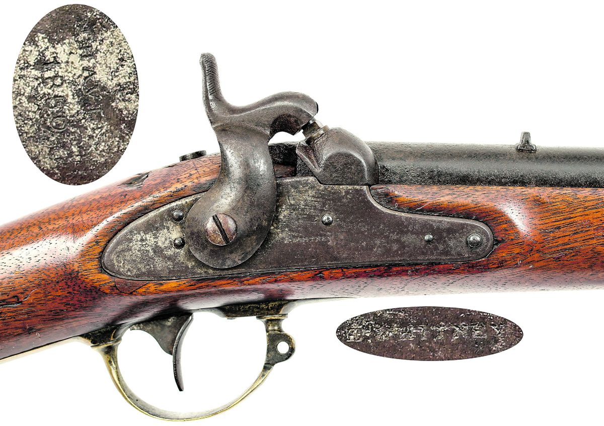 Lock area of the C.S. altered Whitney Mississippi rifle. Insets show the standard E. WHITNEY lock mark and two line NEW HAVEN over 1850 date at rear of lock.