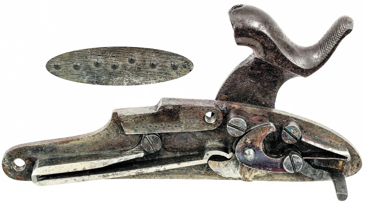 Interior of the C.S. altered Mississippi rifle’s lock showing the cryptic 7 dot marking and crudely replaced tumbler.