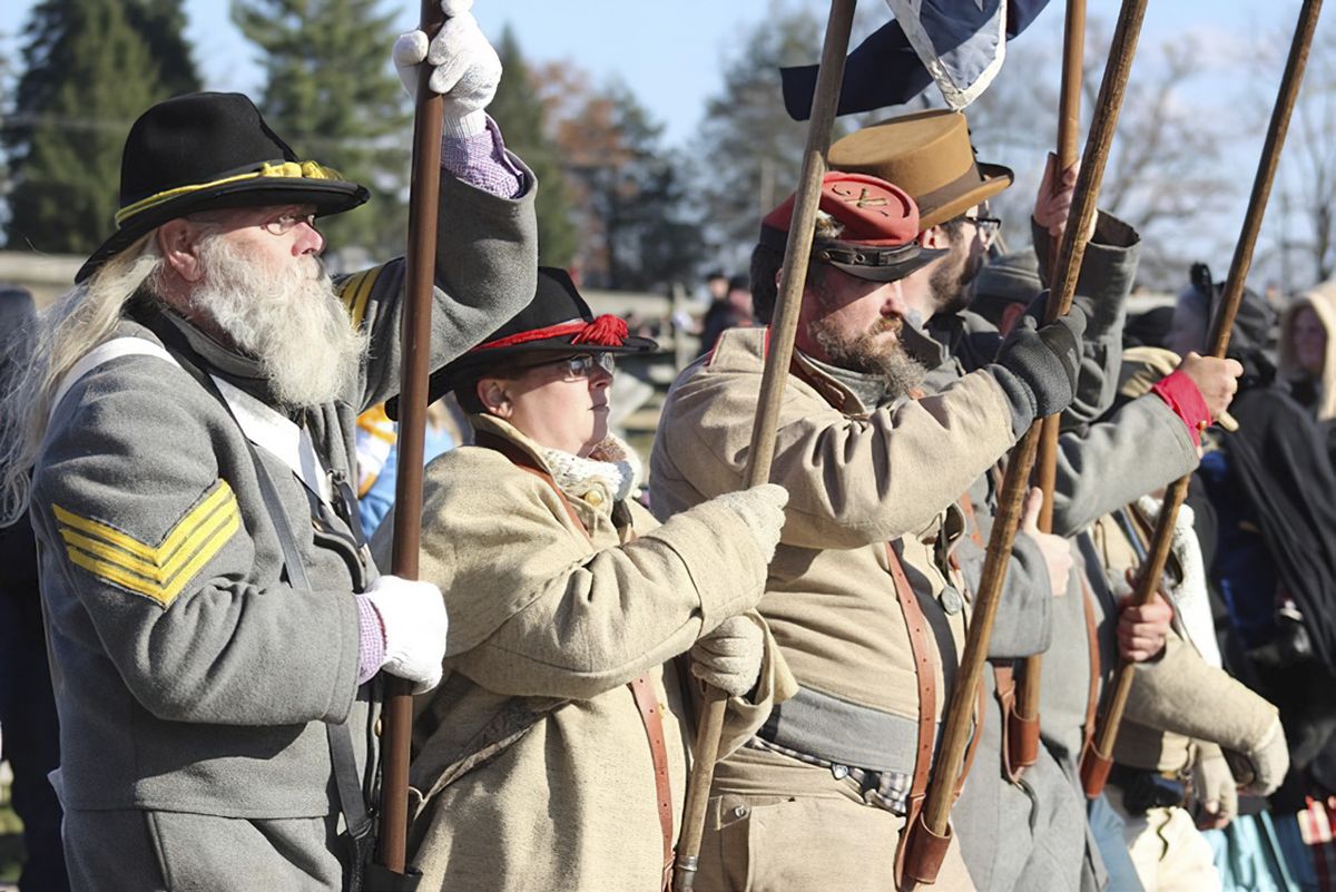Thousands gather for Remembrance Day — lead photograph from the original article