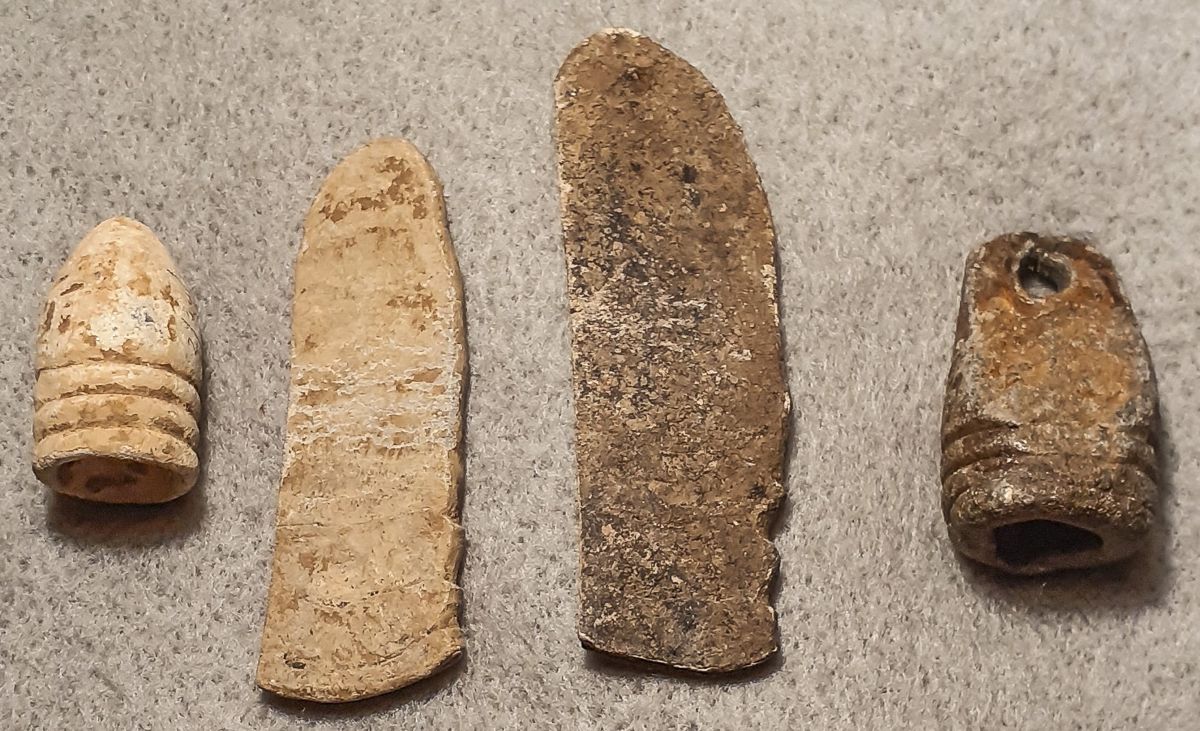Recovered U.S. Minié ball bullets from Aquia Creek Landing area. The two bullets in the center were flattened. The far right is a .69 caliber bullet made into a fishing sinker.