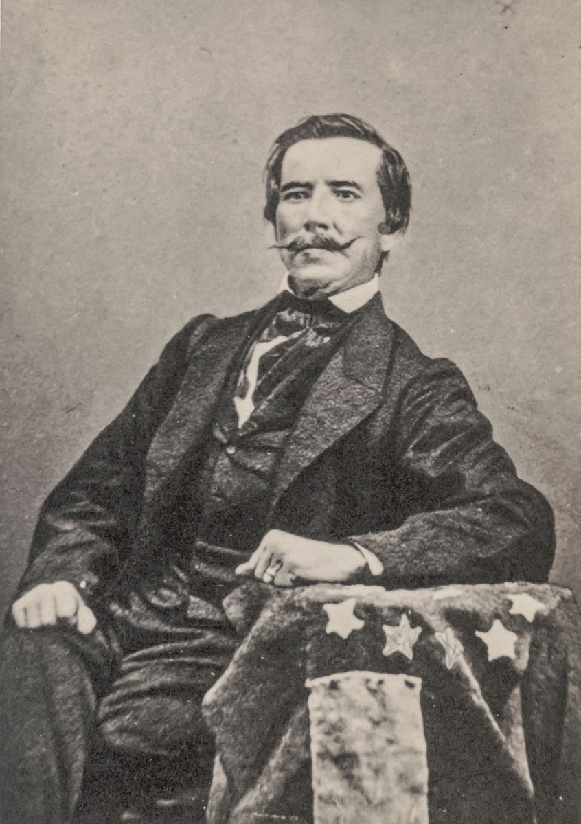 Rear Admiral Raphael Semmes of the Confederate Navy with Confederate flag. (Library of Congress)